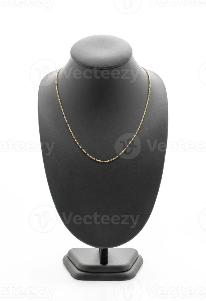 beau et collier de luxe avec collier de support de bijoux sur fond blanc photo