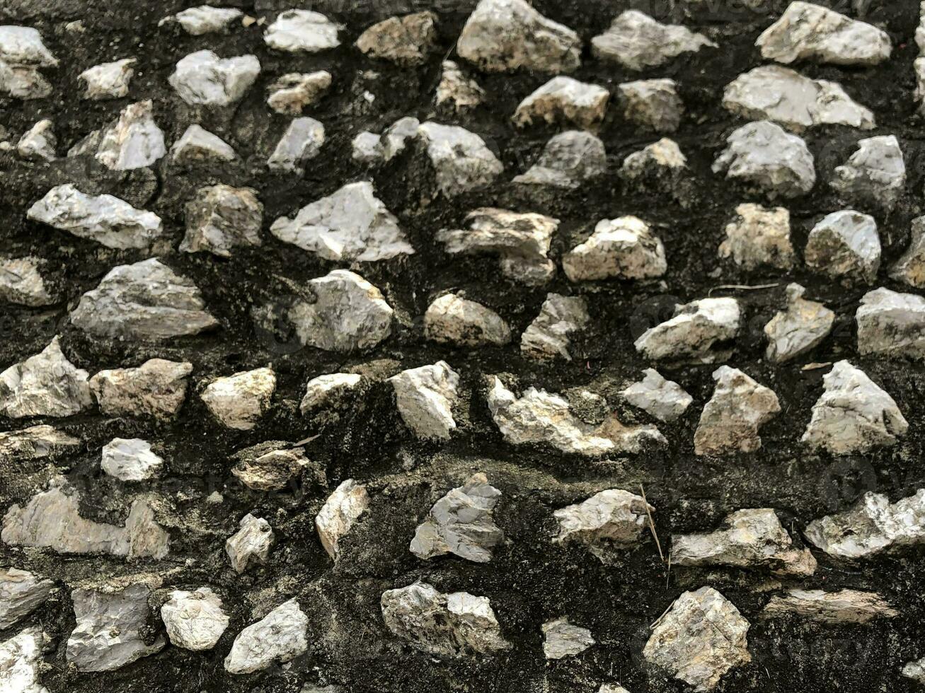 une mur de rochers cette sont arrangé dans une modèle photo