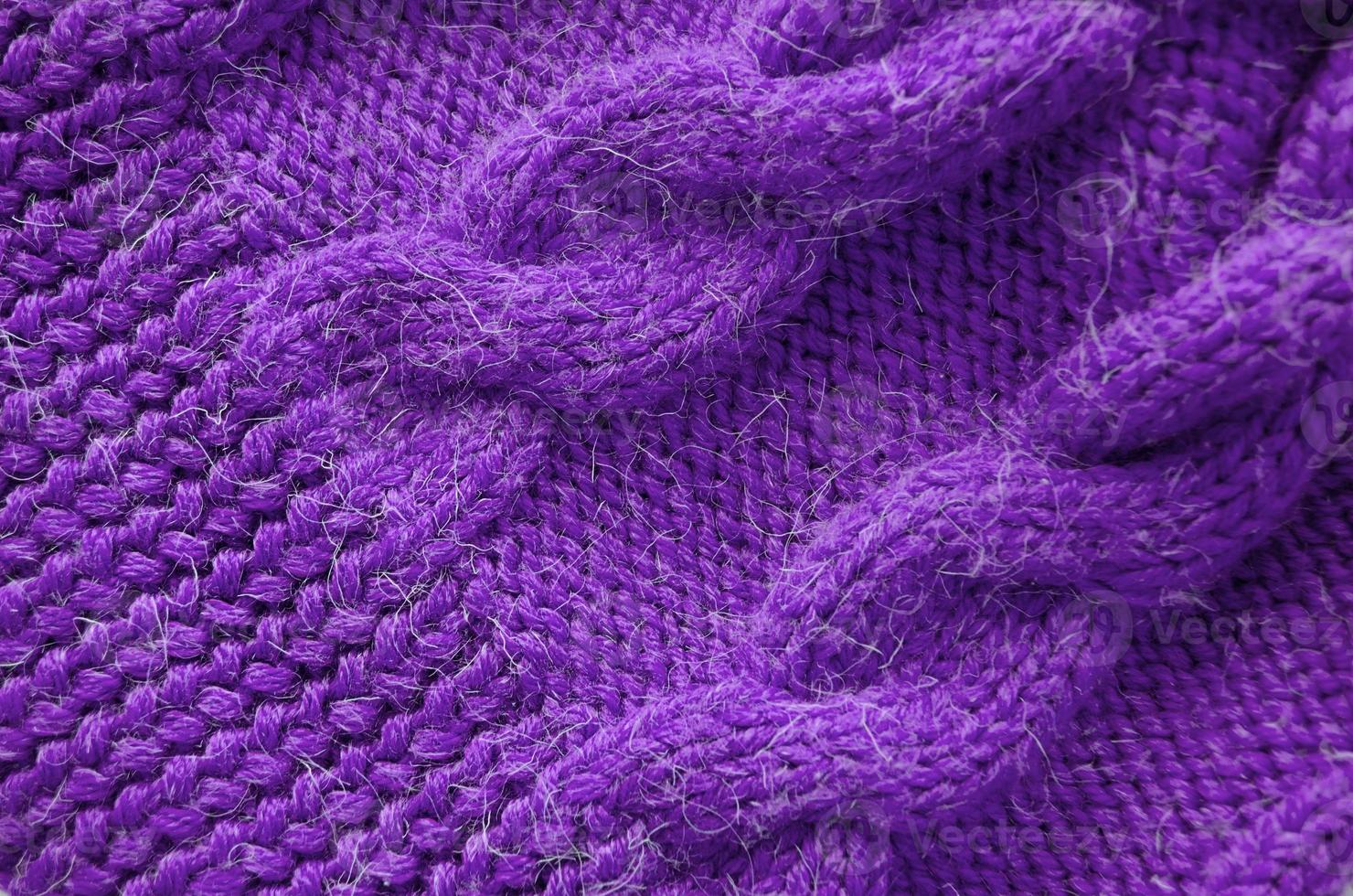 fond tricoté. texture tricotée. modèle de tricot de laine. photo