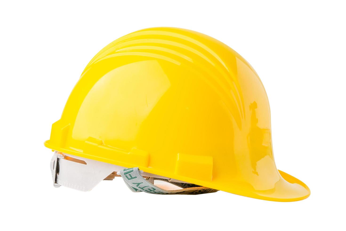 Casque de construction jaune isolé sur fond blanc photo