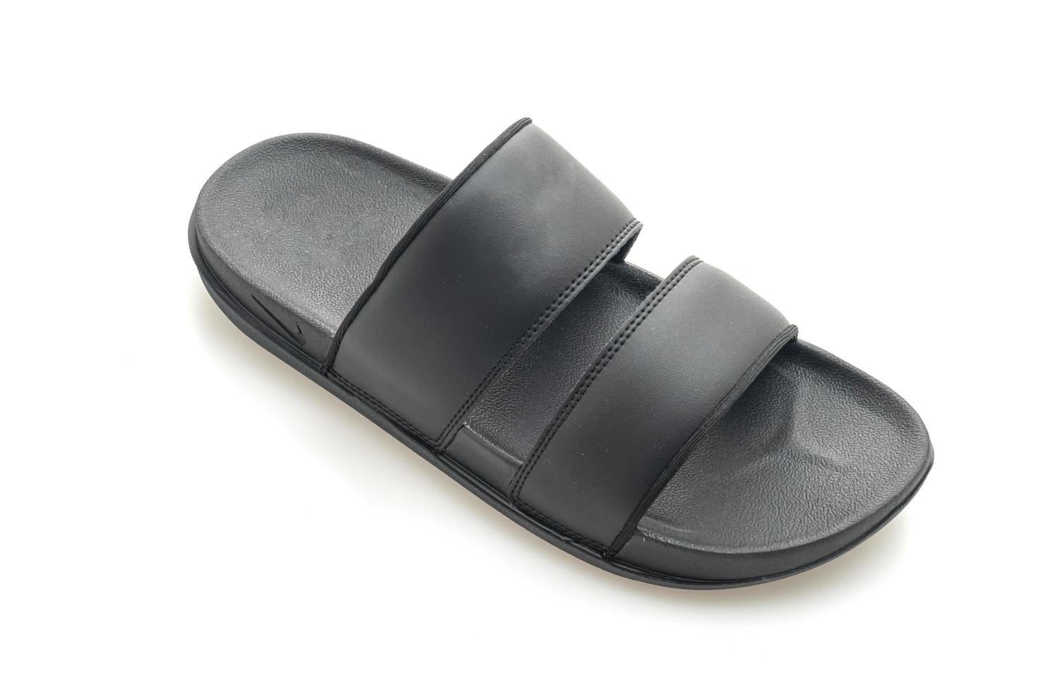sandales en cuir noir isolé sur fond blanc photo