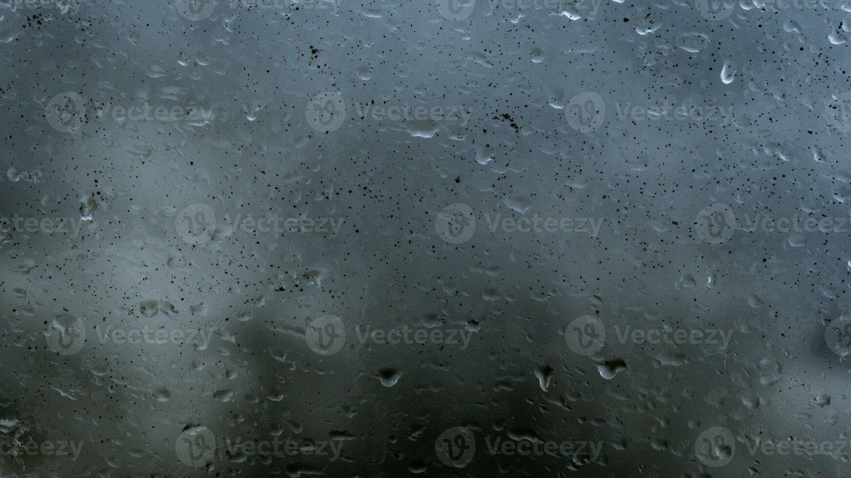 pluie l'eau gouttes sur verre photo