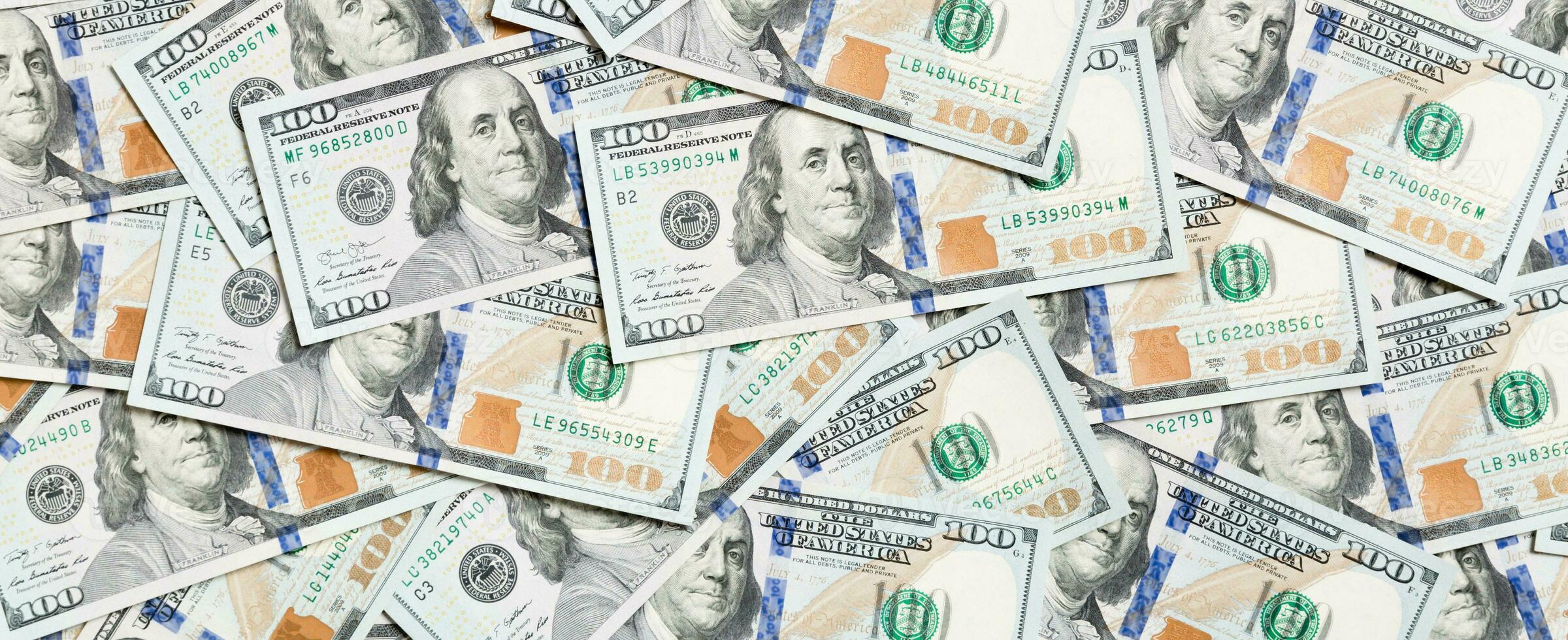 vue de dessus du fond de l'argent américain. tas de dollars en espèces. concept de billets de banque en papier photo