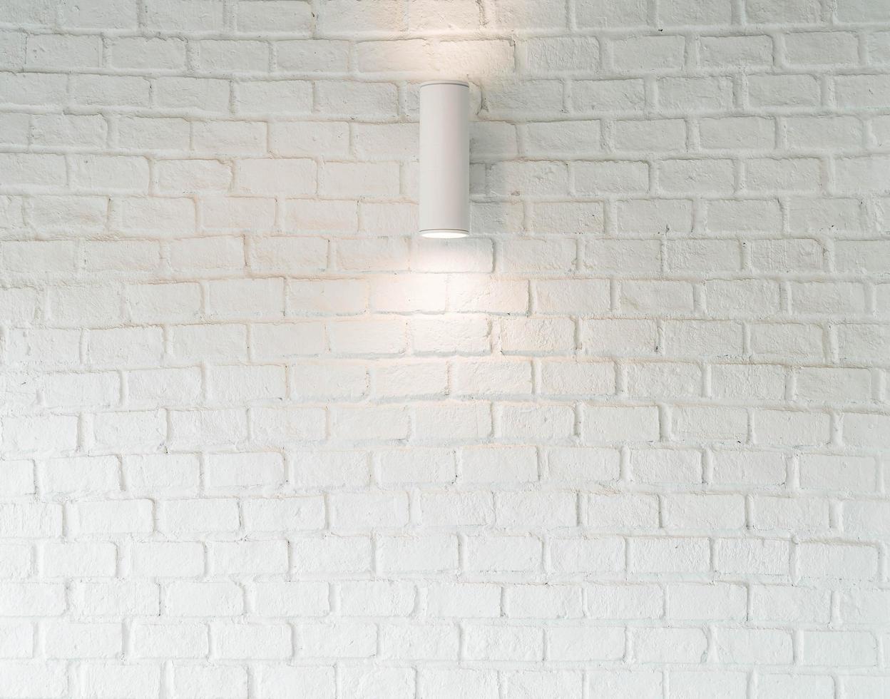 lampe sur fond de mur blanc photo