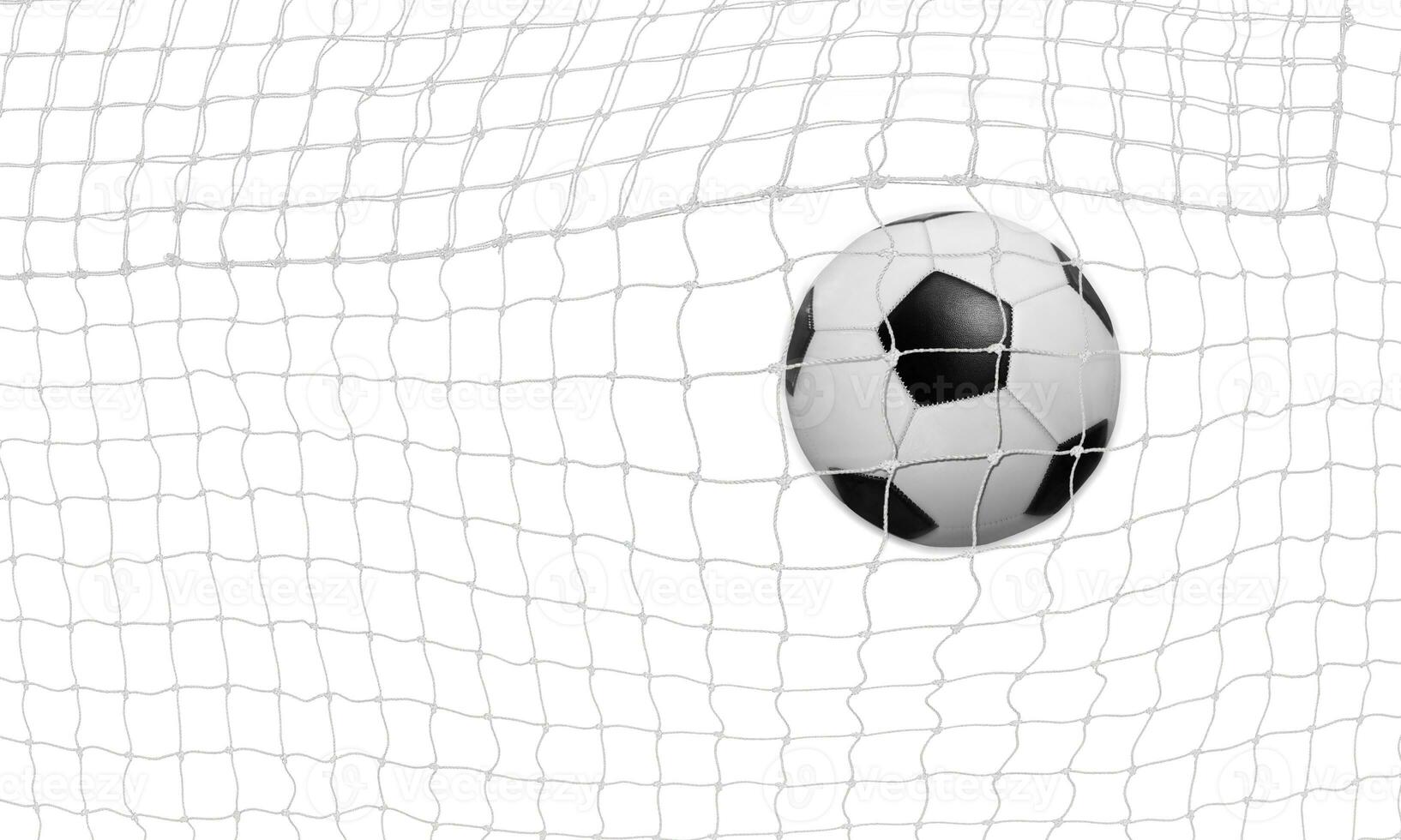 le football Balle va dans le net et notes une but. sur une blanc Contexte. photo