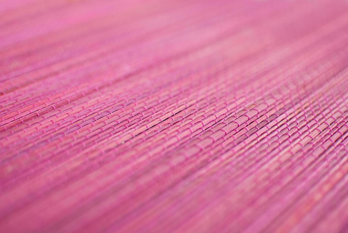 fond de tapis de paille rose bambou photo