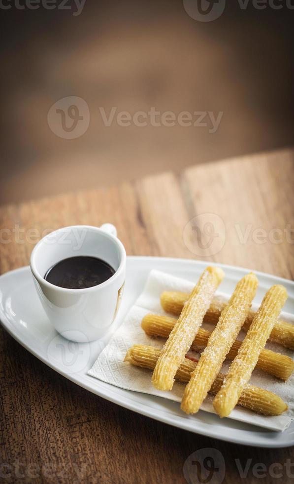 churros et chocolat beignets espagnols pâtisserie beignets avec sauce petit déjeuner collation photo