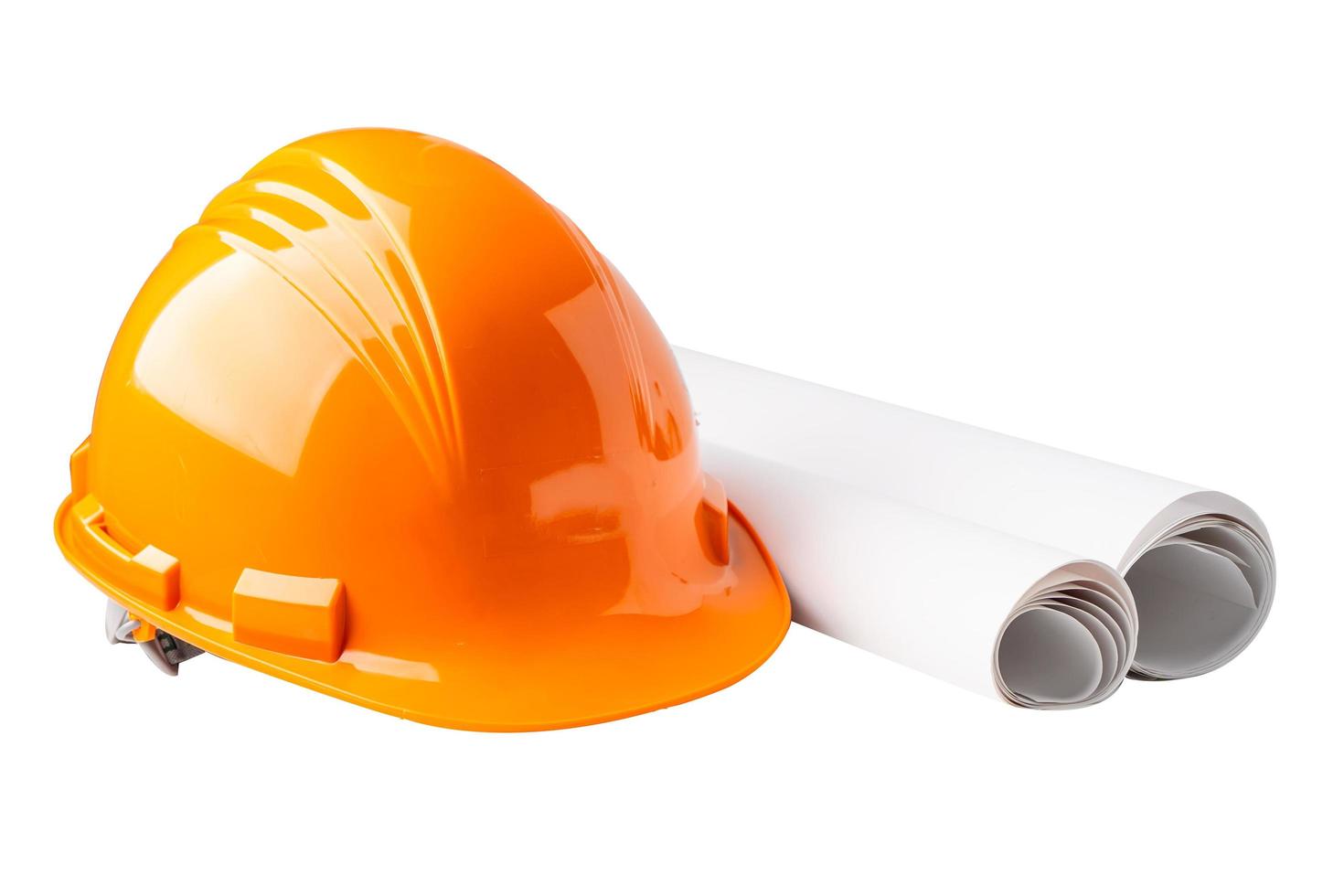 casque de construction jaune avec plan, concept de sécurité de l'ingénieur. photo