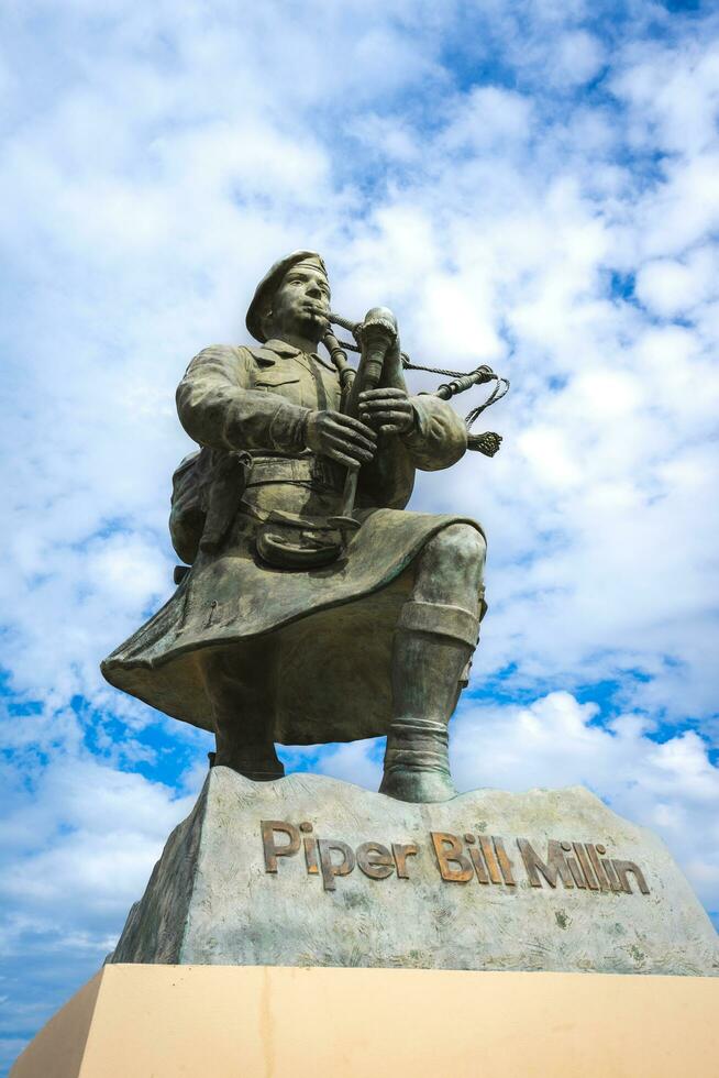 statue et Mémorial pour cornemuseur facture millin. à épée plage, la Normandie, France. août 15 2023. photo