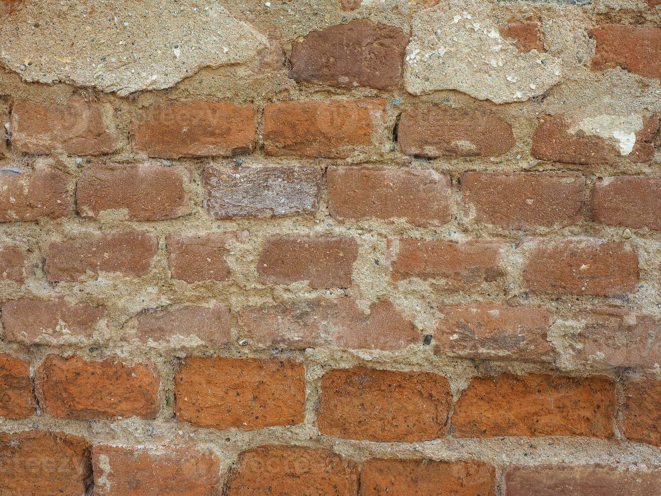 vieux fond de mur de brique rouge de style industriel photo