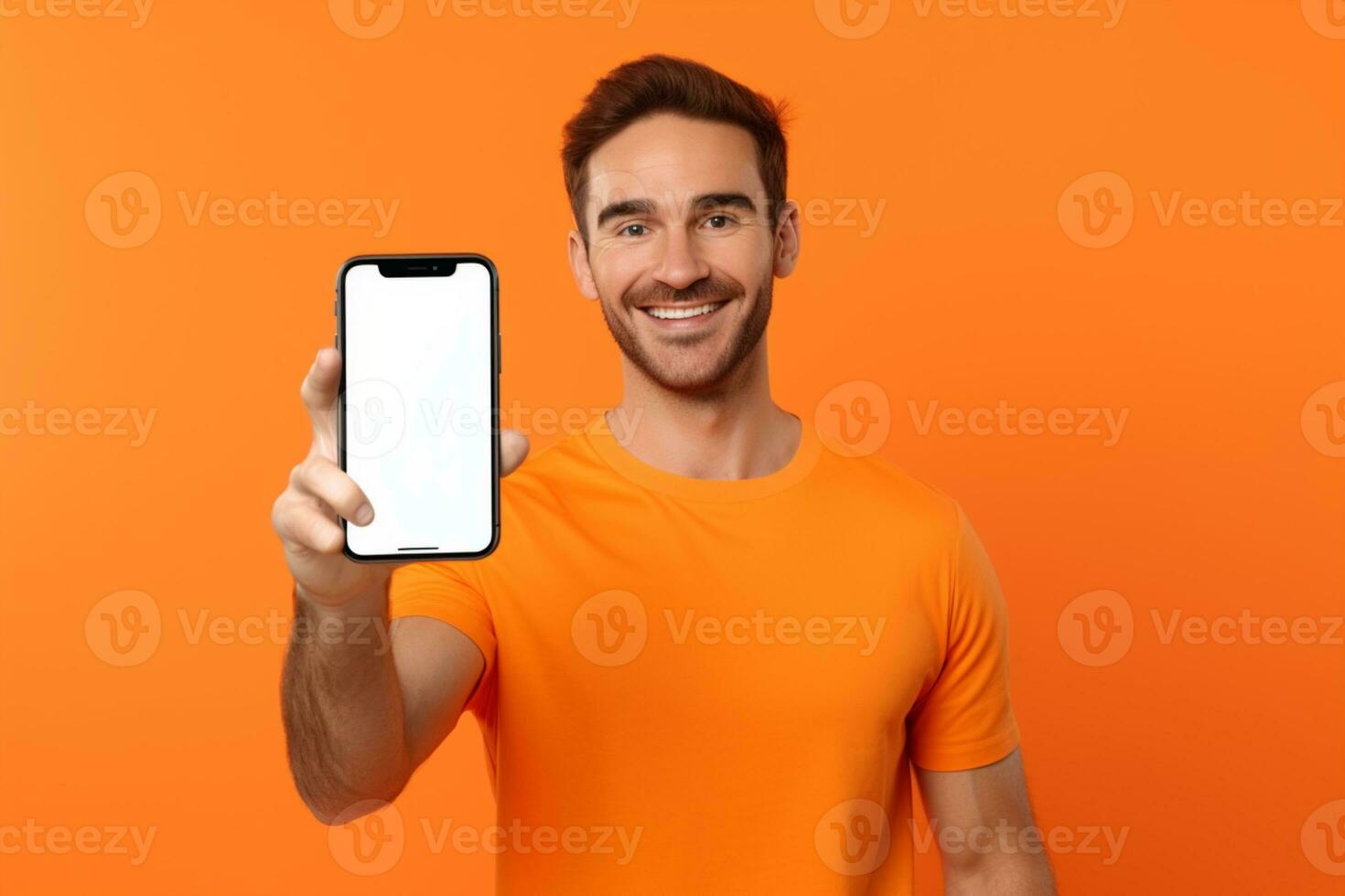 portrait de Jeune homme La publicité Nouveau téléphone intelligent montrant il à caméra contre Orange Contexte ai génératif photo