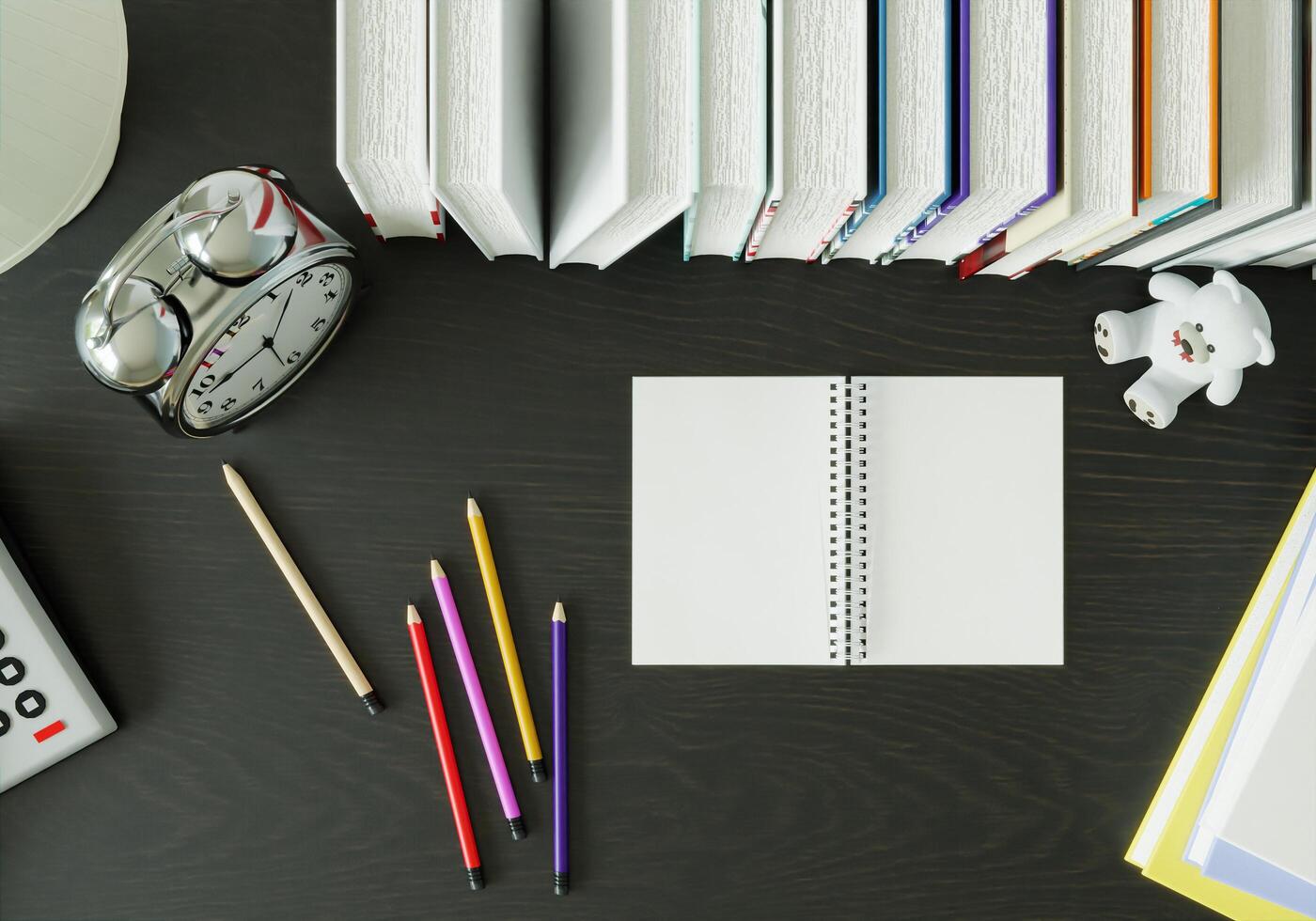 livres et crayons posés sur la table photo