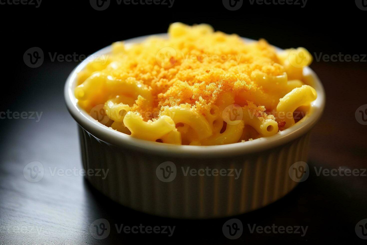 macaroni et fromage dans une bol sur une en bois table ai généré photo