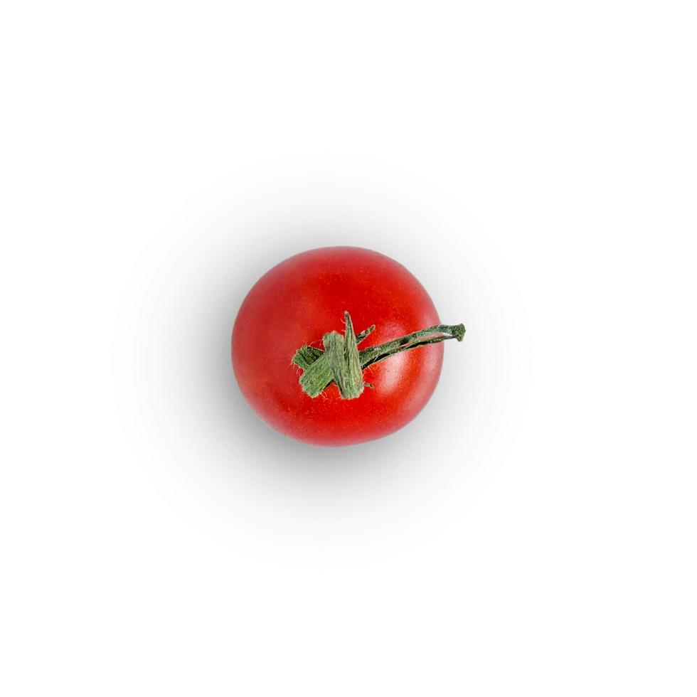 tomate fraîche sur fond blanc pour isolé avec un tracé de détourage. photo