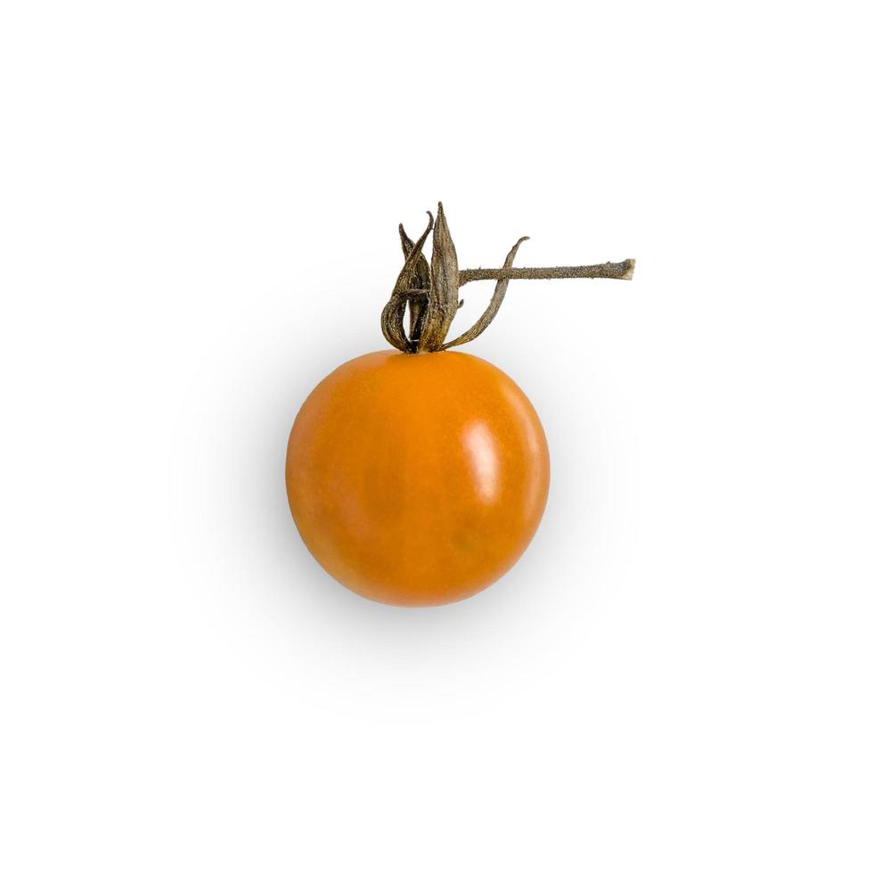 tomate fraîche sur fond blanc pour isolé avec un tracé de détourage. photo