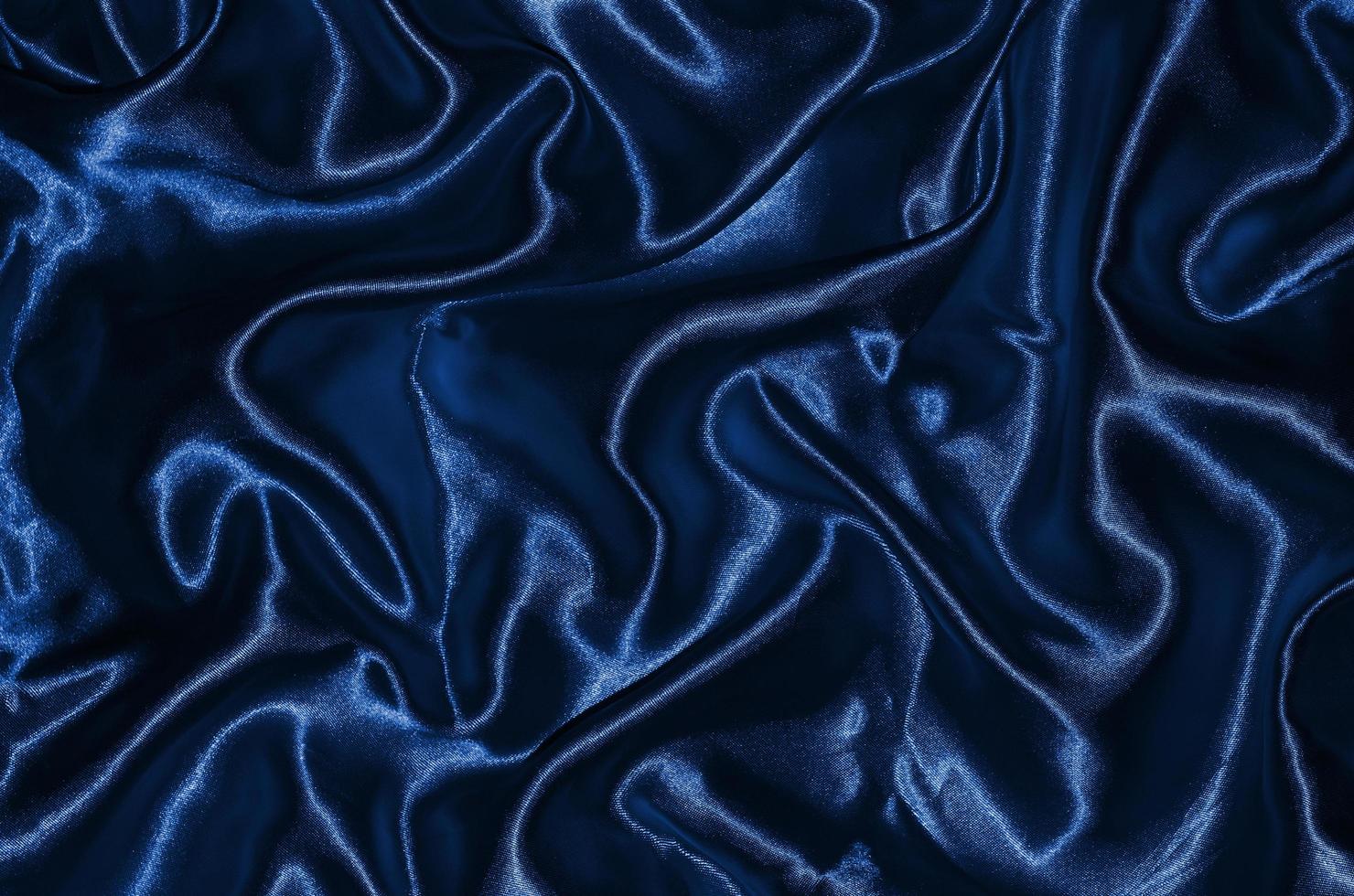 fond et papier peint en tissu bleu profond et textile à rayures photo
