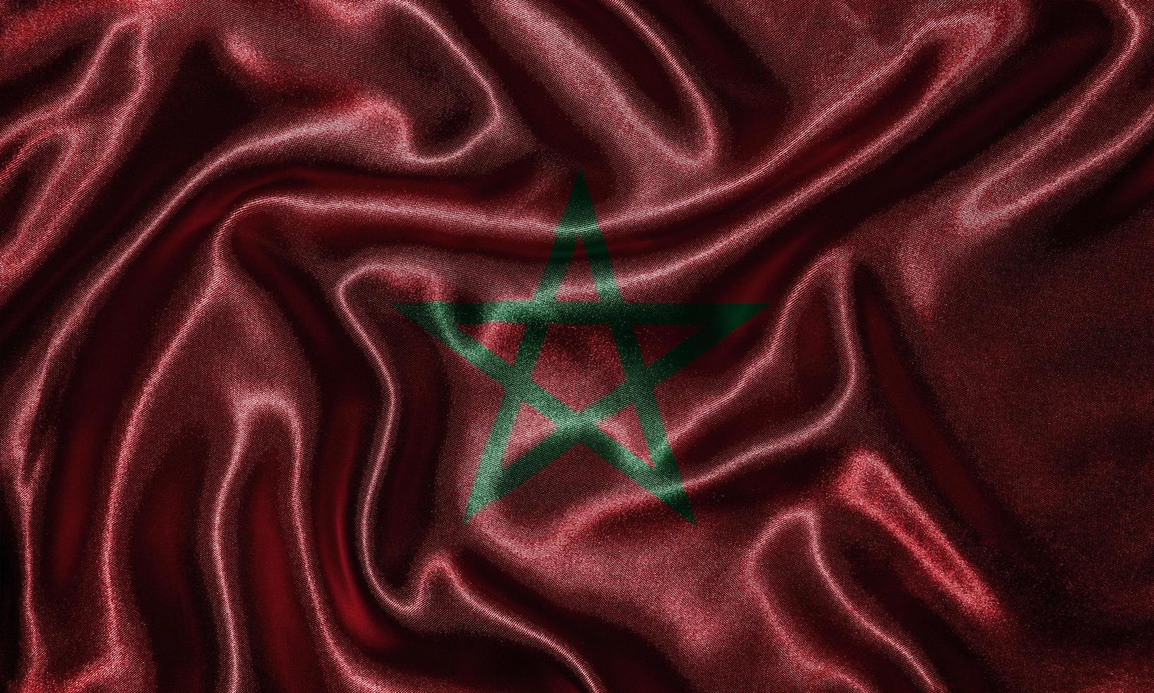 papier peint par drapeau du maroc et drapeau ondulant par tissu. photo