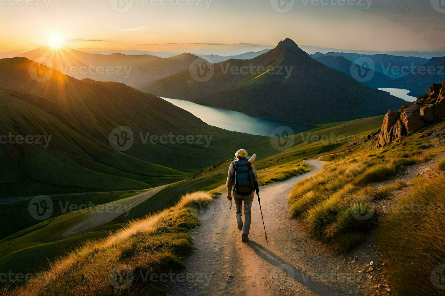 une homme des promenades sur une chemin dans le montagnes. généré par ai photo