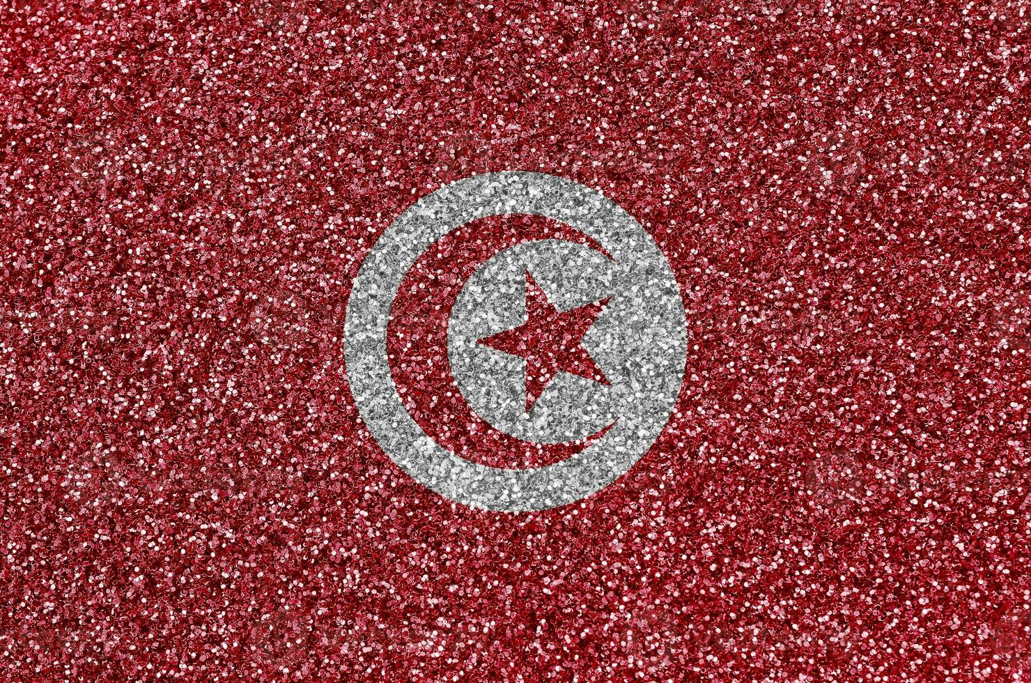 Tunisie drapeau représenté sur beaucoup petit brillant paillettes. coloré Festival Contexte pour fête photo