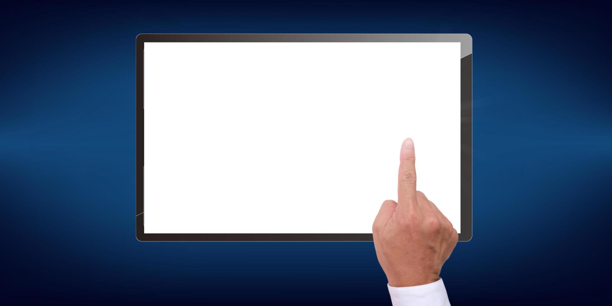 tablette sur fond bleu et écran blanc photo