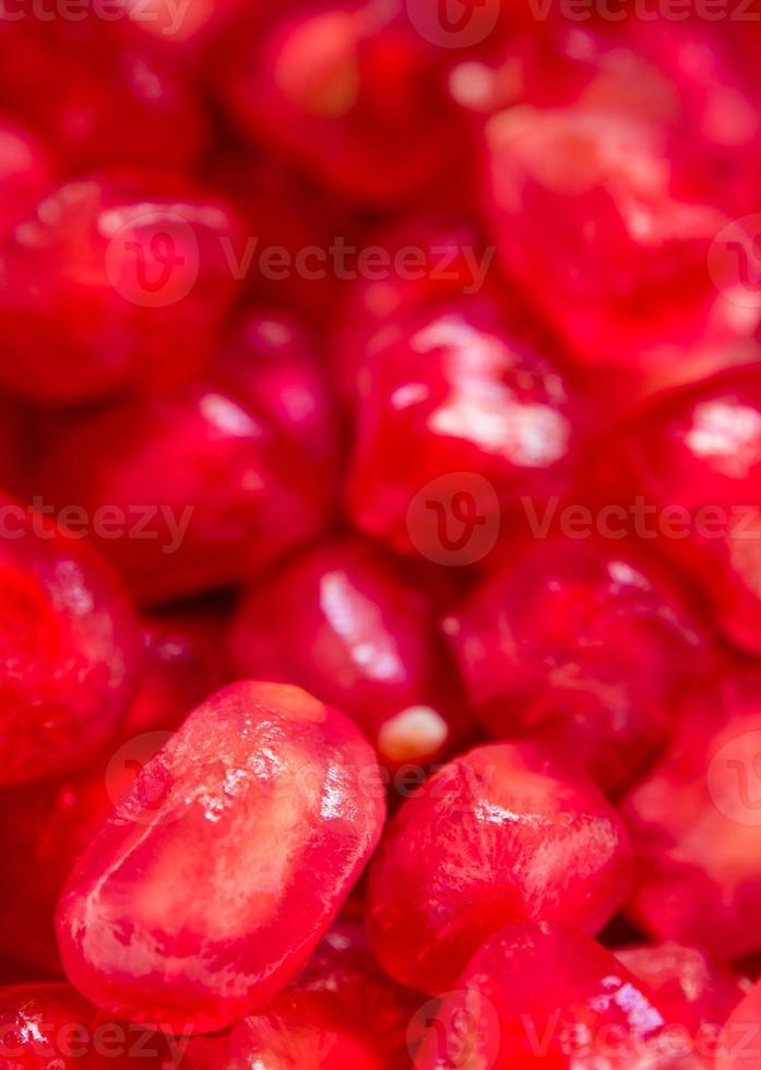 fond plein cadre de graines de grenade comme fond de fruits photo