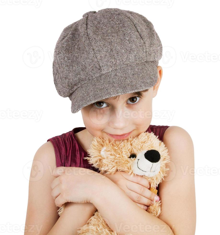 fille douce avec un ours en peluche photo