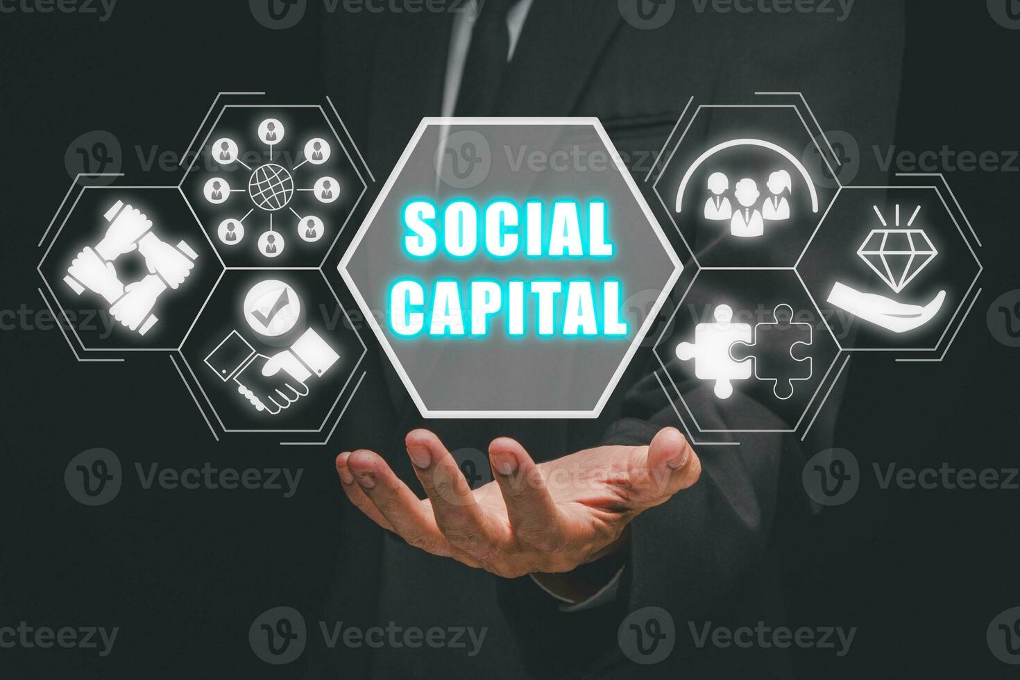 social Capitale concept, homme d'affaire main en portant social Capitale icône sur virtuel filtrer. photo