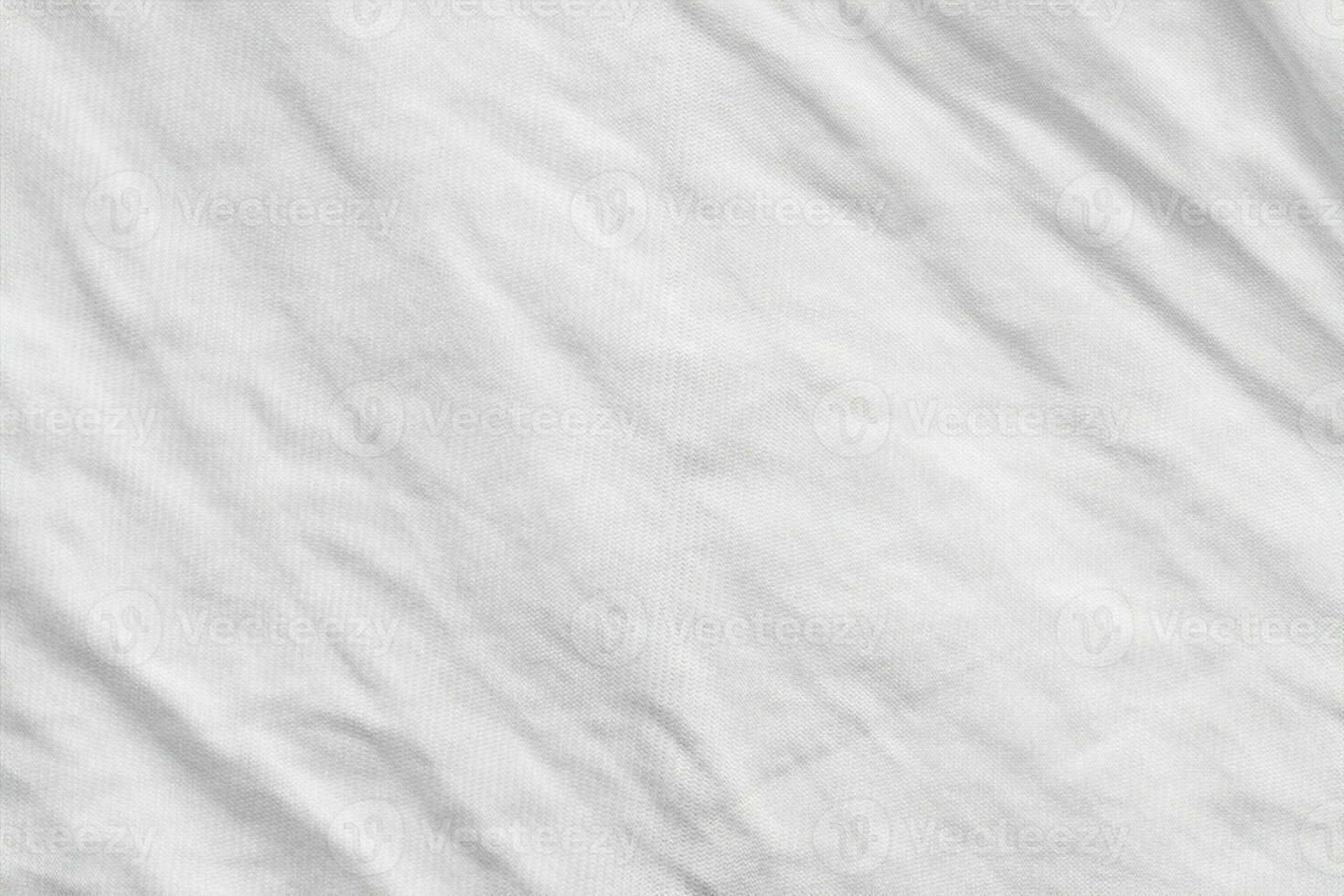 fond de texture de tissu de chemise en coton froissé blanc photo