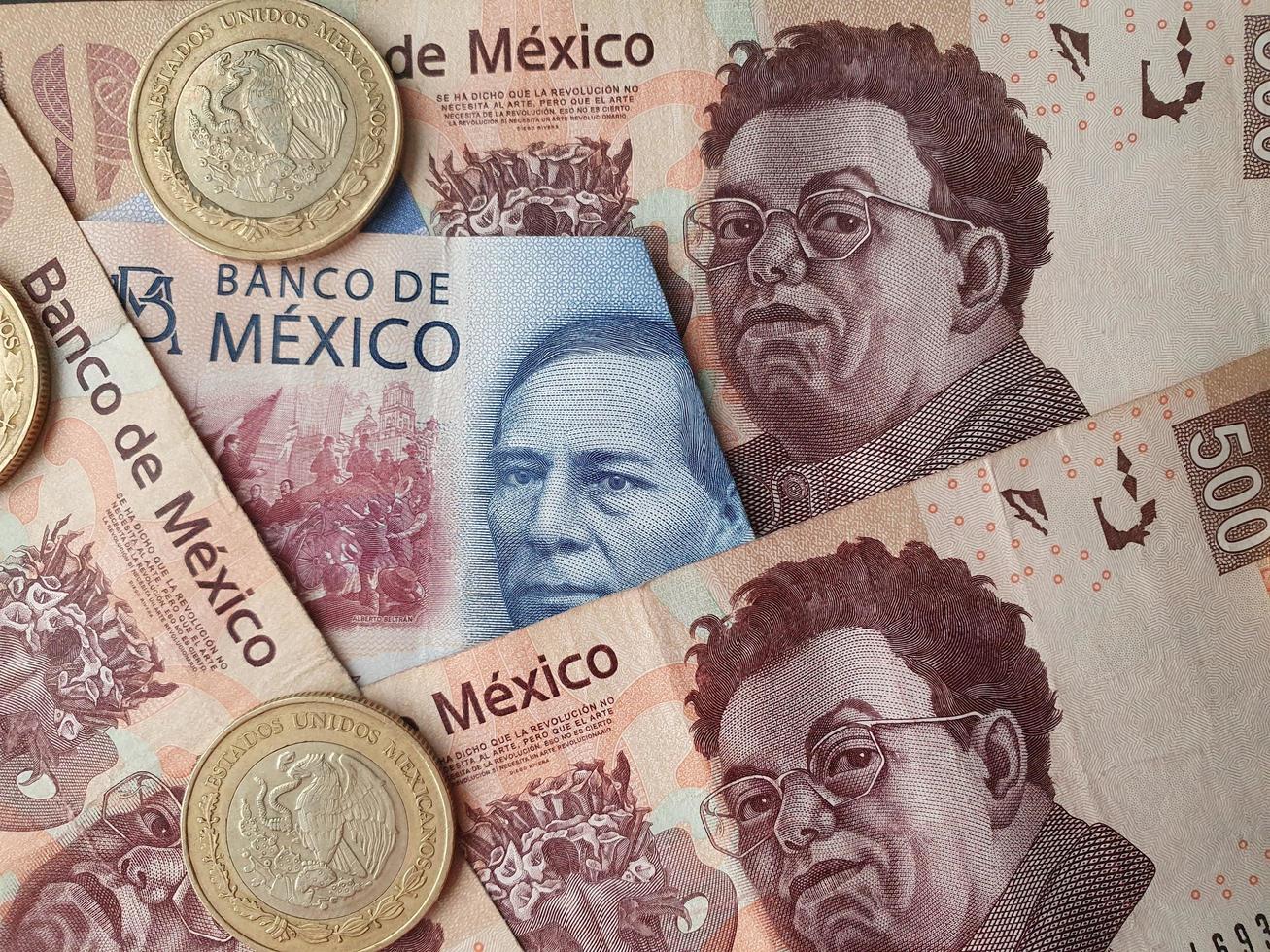 arrière-plan pour les thèmes de l'économie et de la finance avec de l'argent mexicain photo