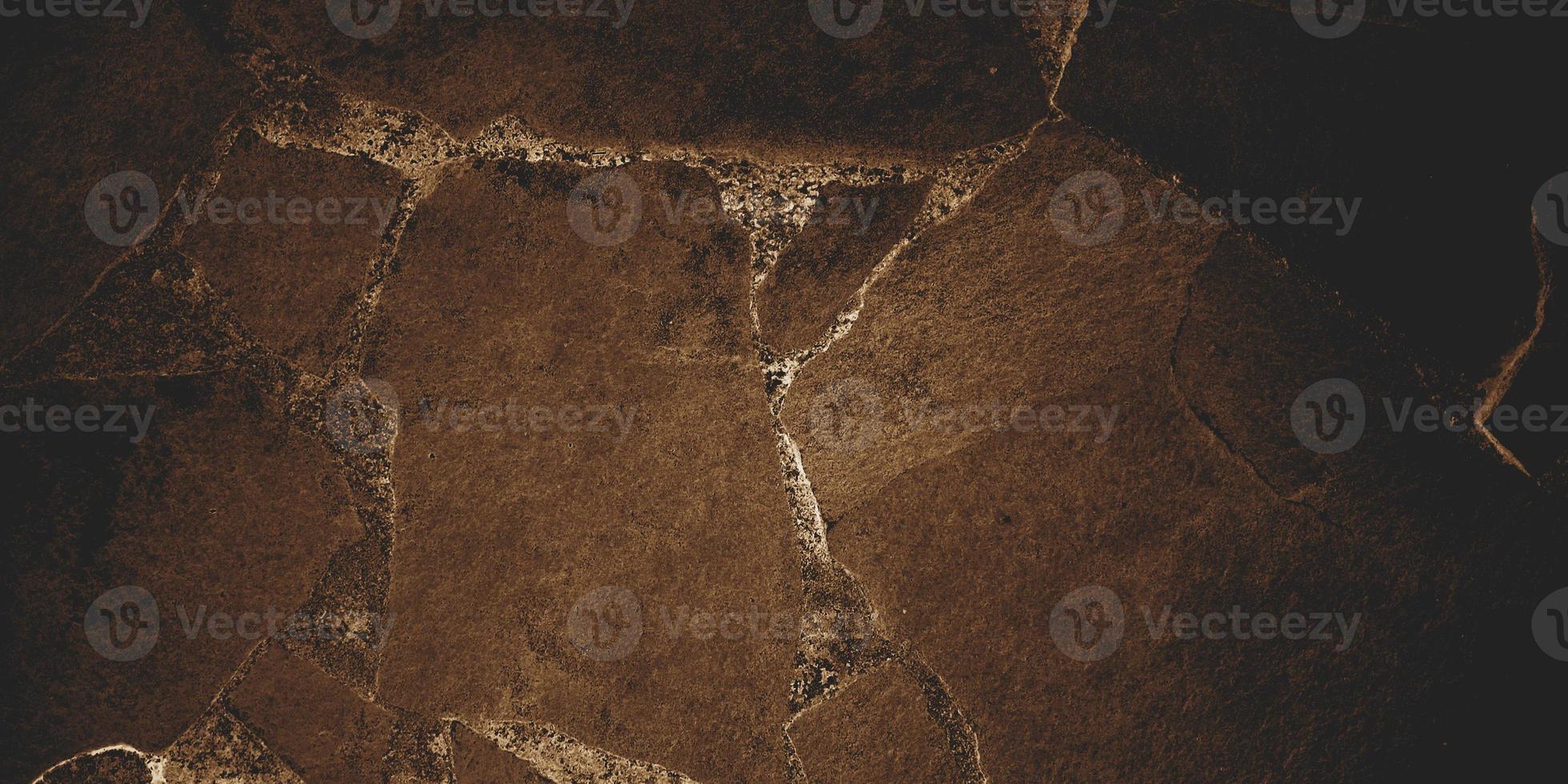 vieux fond de mur de béton, le béton brun doré a un fond fibreux. photo