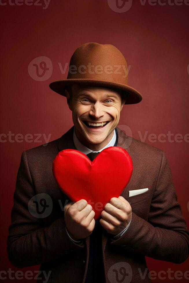 ai généré portrait de une content homme avec une rouge cœur sur la Saint-Valentin journée concept. photo