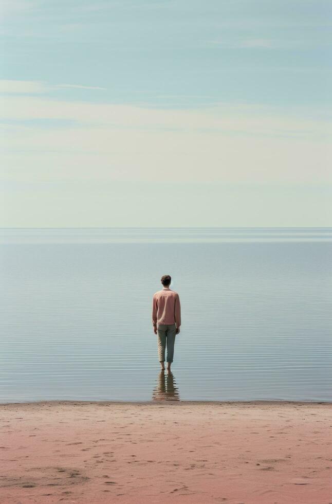 ai généré une homme est permanent à le plage près le océan, photo