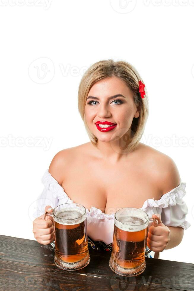 magnifique Jeune blond fille de oktoberfest Bière Stein photo