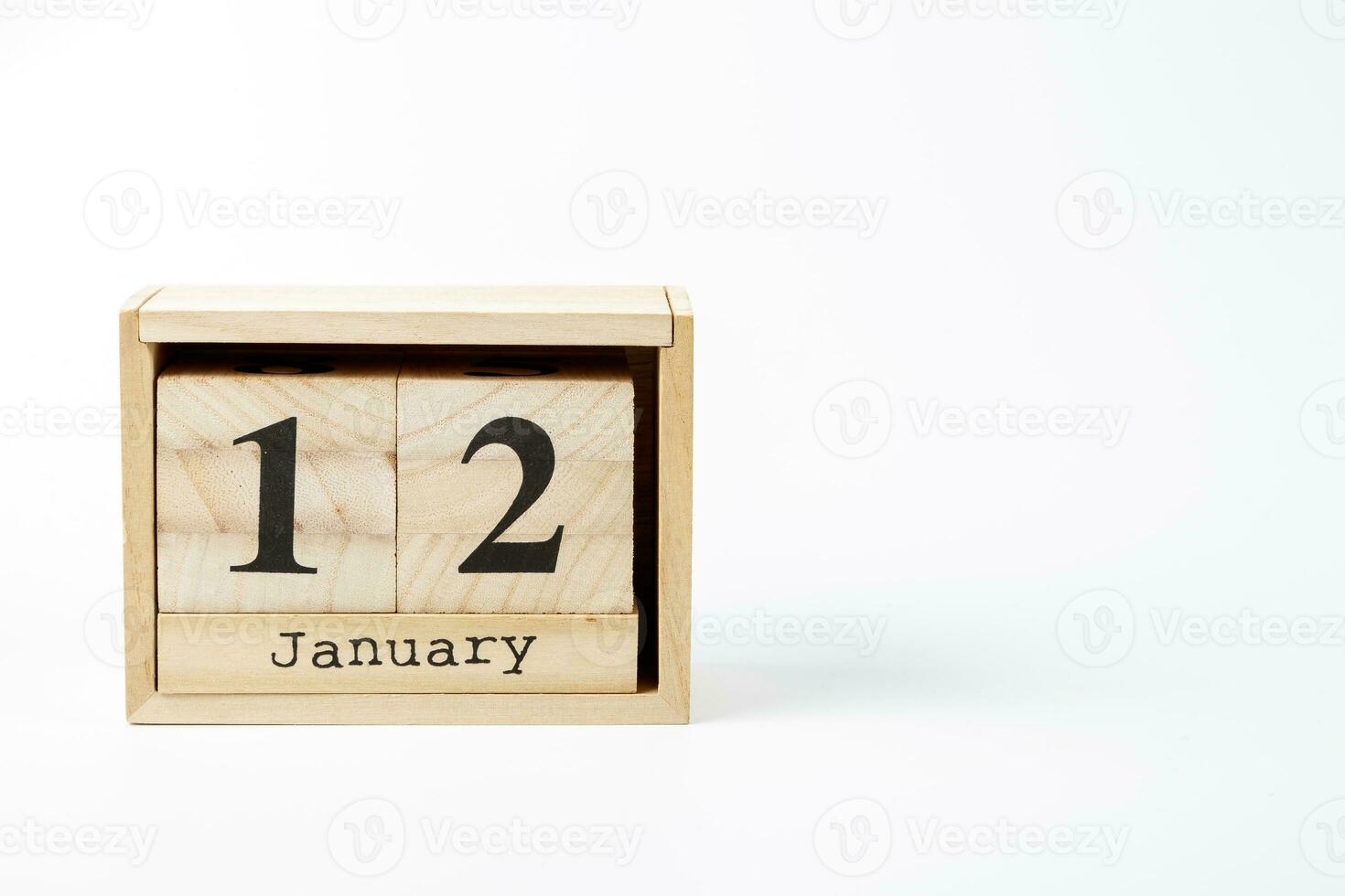 en bois calendrier janvier 12 sur une blanc Contexte photo