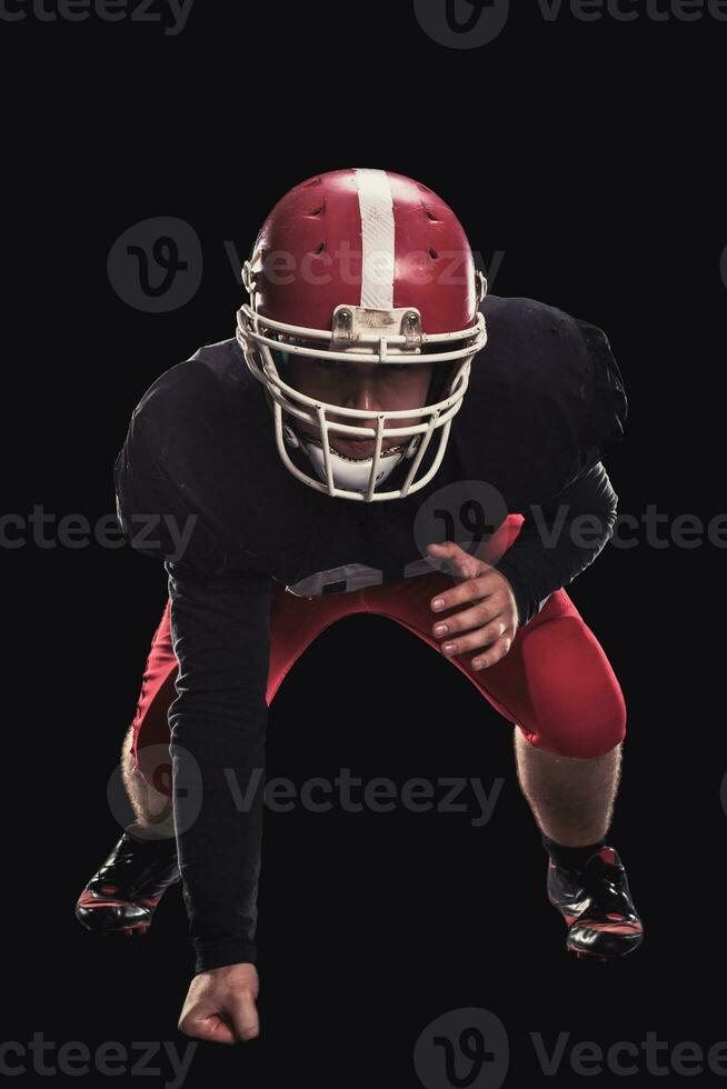 Football joueur sur foncé Contexte photo