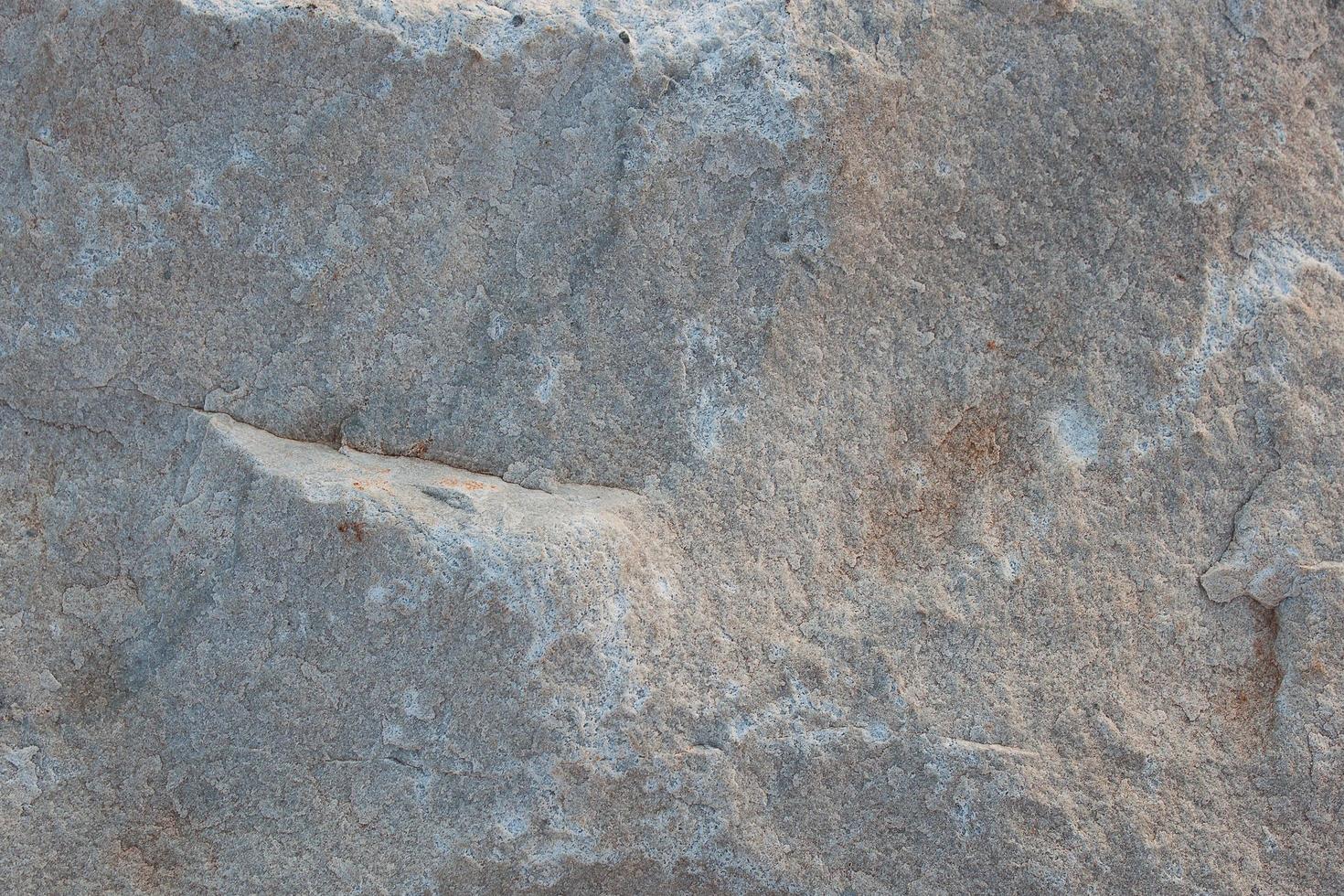 pierre blanche avec des irrégularités en surface photo