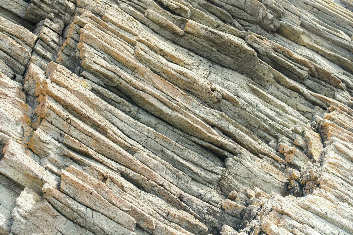 Naturel arrière-plan, Roche fragment de volcanique lave Colonnes photo