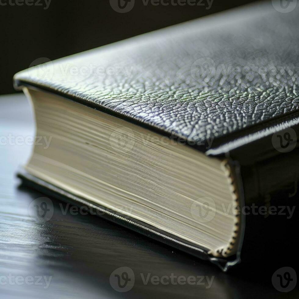 ai généré proche en haut vue de une noir livre sur une en bois table photo