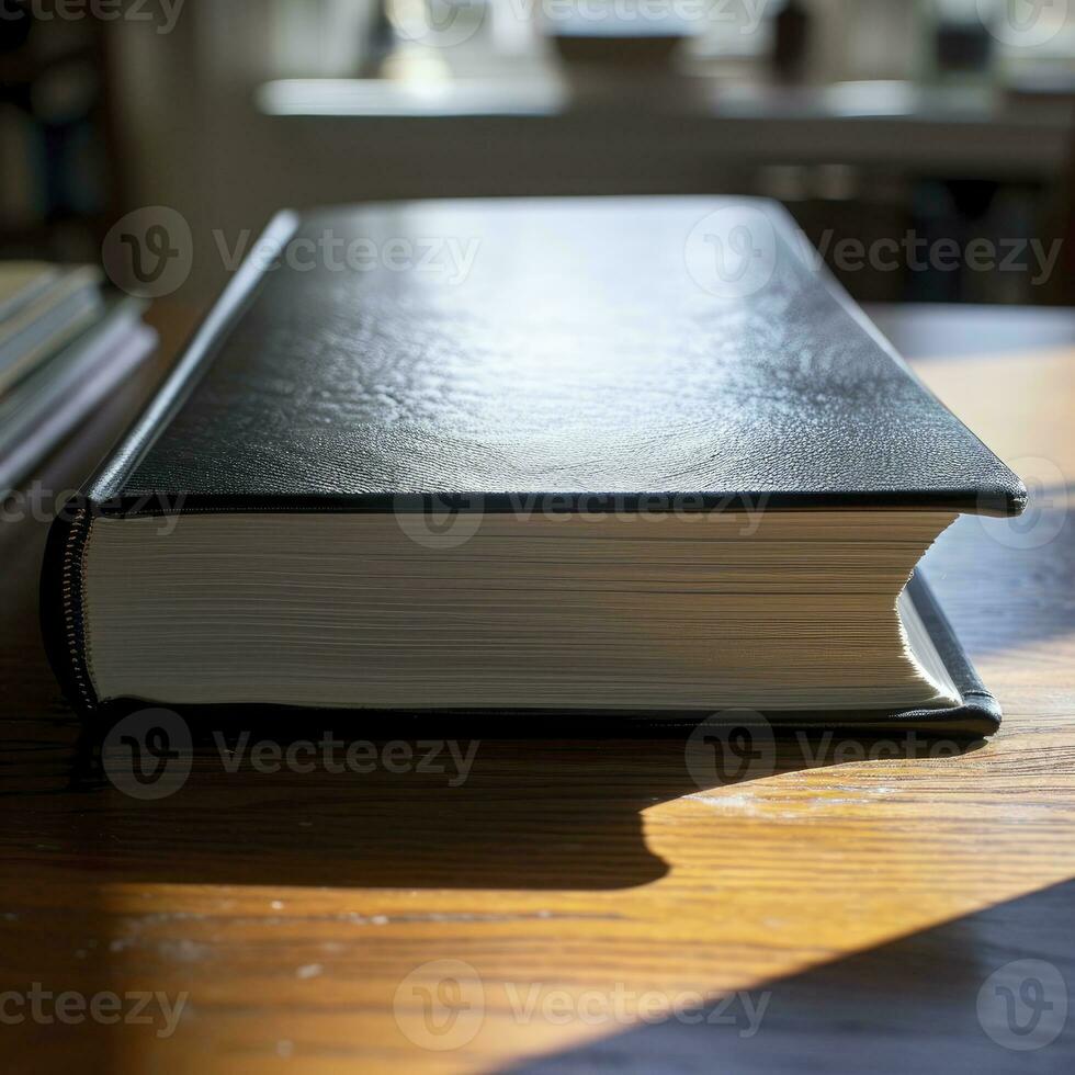 ai généré proche en haut vue de une noir livre sur une en bois table photo