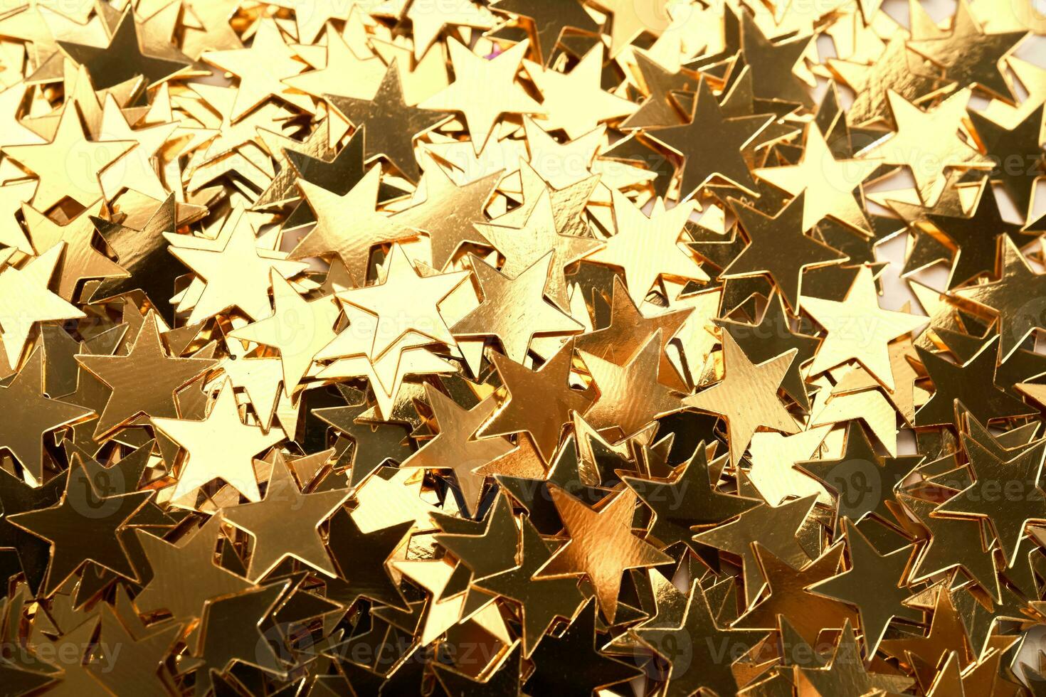 abstrait Noël Contexte avec or étoiles confettis. photo