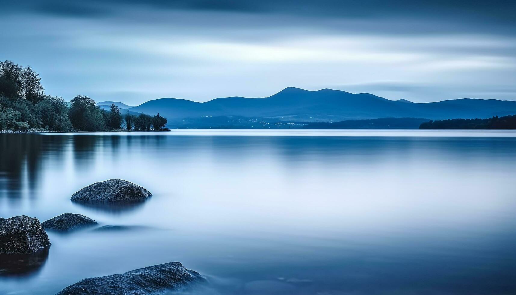 ai généré lisse bleu l'eau reflète tranquille Montagne paysage généré par ai photo