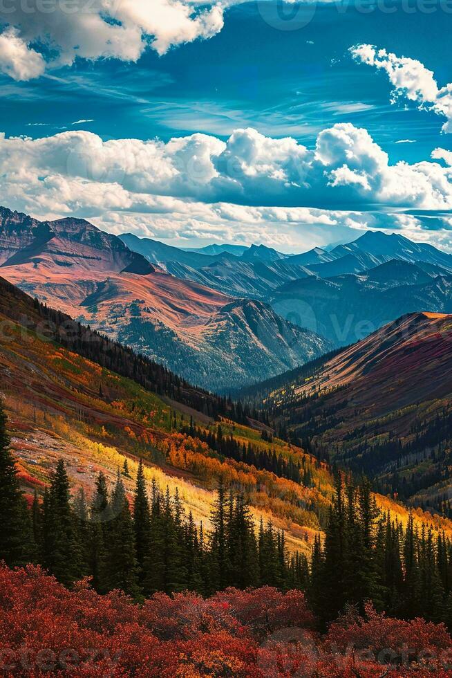 ai généré une étourdissant l'automne paysage avec vibrant couleurs orner le Montagne pentes. le ciel est une brillant bleu avec duveteux des nuages ajouter contraste et profondeur à le scène photo