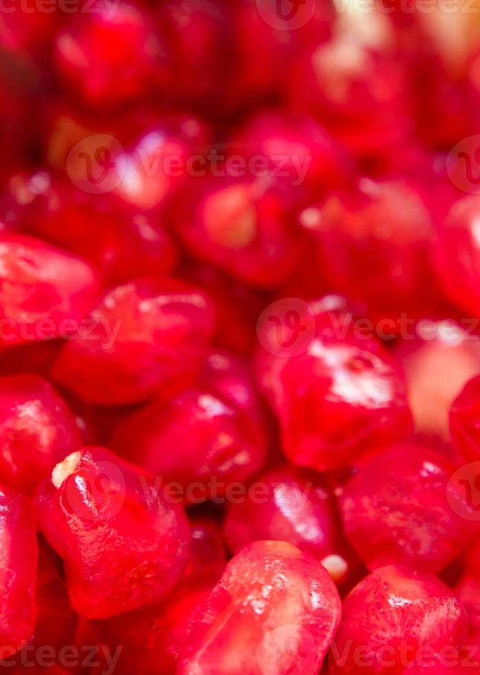 fond plein cadre de graines de grenade comme fond de fruits photo