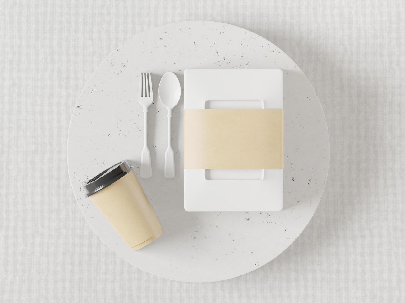 boîtes à lunch, verres, cuillères et fourchettes en plastique placés sur une assiette blanche. photo