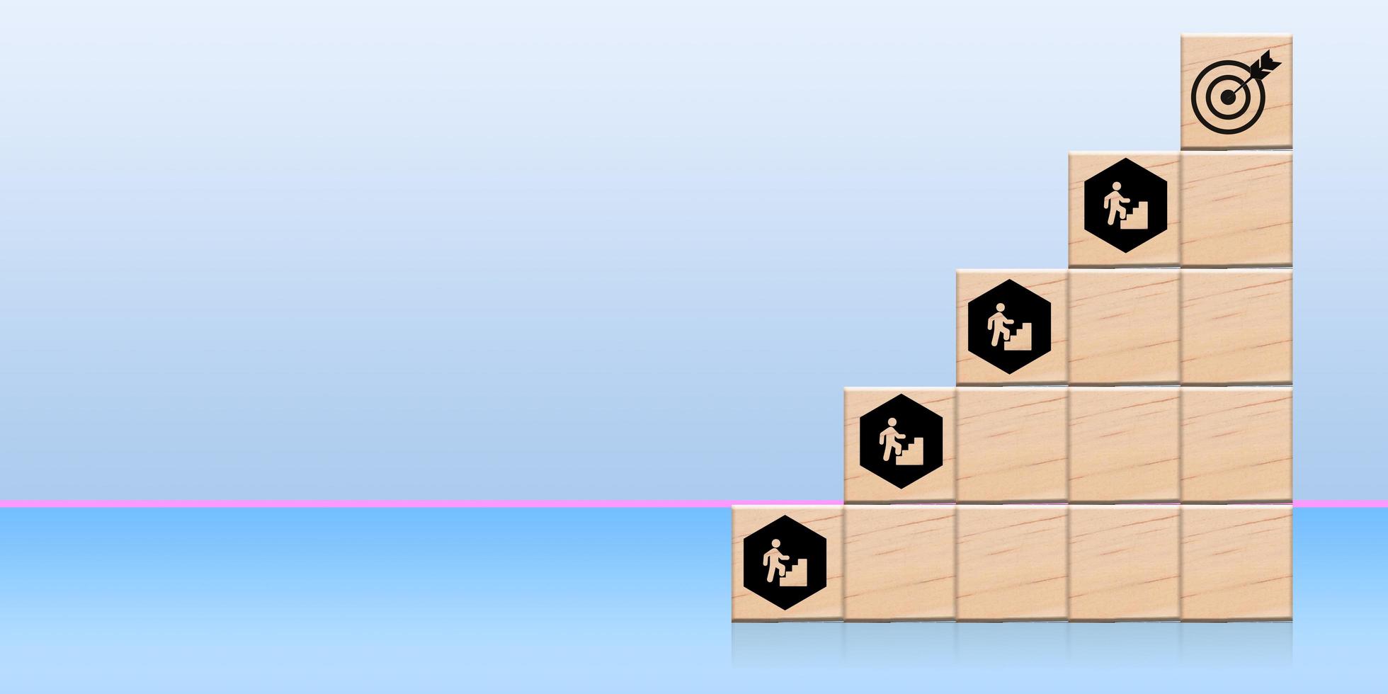 le processus de croissance et de succès du concept d'entreprise, de près et de main personnelle d'un homme d'affaires organisant un cube de bois avec empilement de flèches comme escalier. à la cible photo