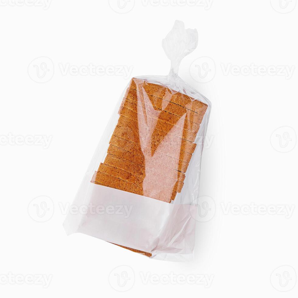 proche en haut de blanc tranché pain grillé pain dans transparent emballage photo