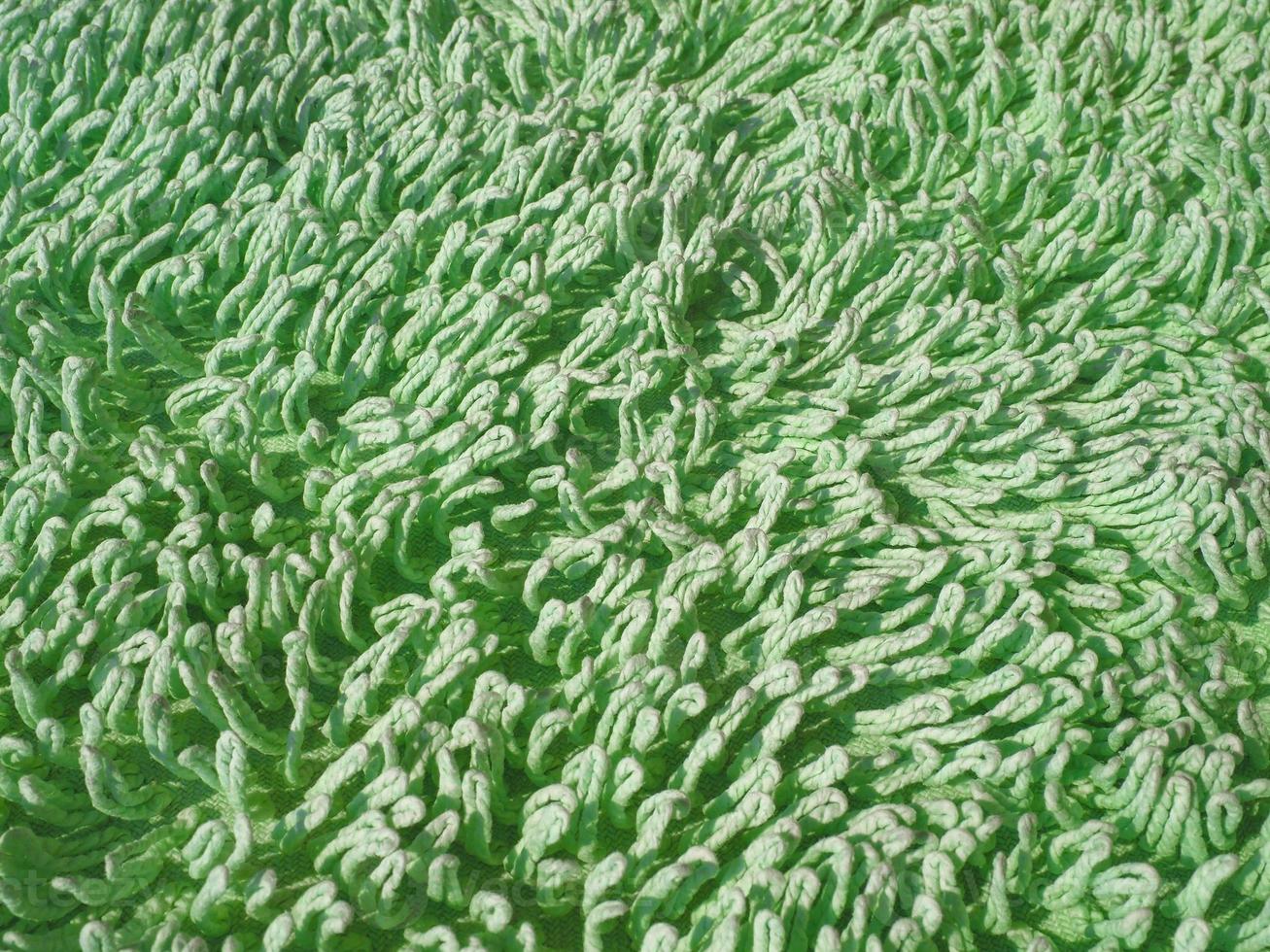 fond de texture de tapis vert photo