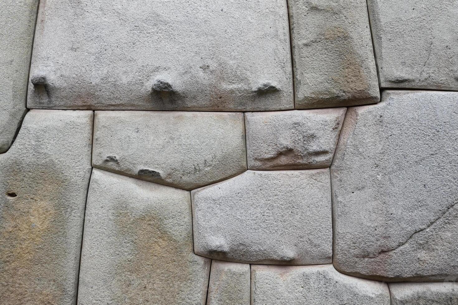 pierre inca maçonnerie dans le mur de le archevêque résidence, cusco, Pérou photo