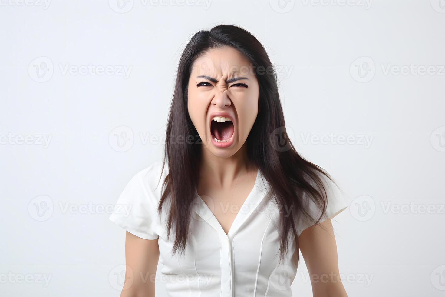 ai généré en colère Jeune adulte asiatique femme en hurlant sur blanc Contexte. neural réseau généré photoréaliste image. photo