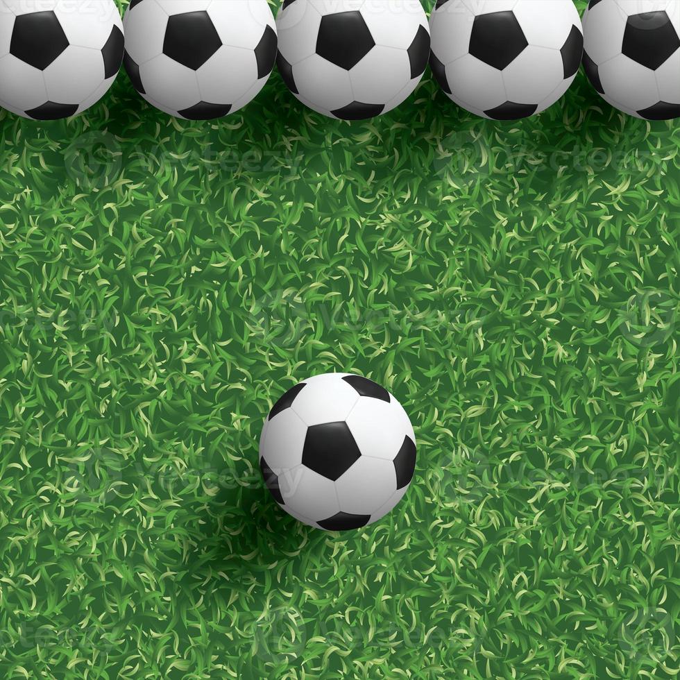 ballon de football football sur l'herbe verte du fond de terrain de football. graphique d'illustration. photo